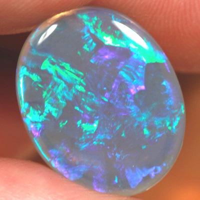 SOLID CRYSTAL OPAL Large opal 9cts! Peacock fire in alarge rolling flashes. Bright, clean colours. With VIDEO